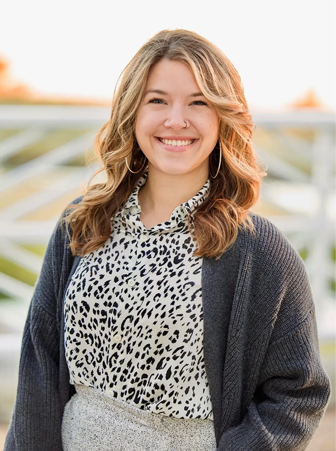Realtor closing a deal at a table with clients